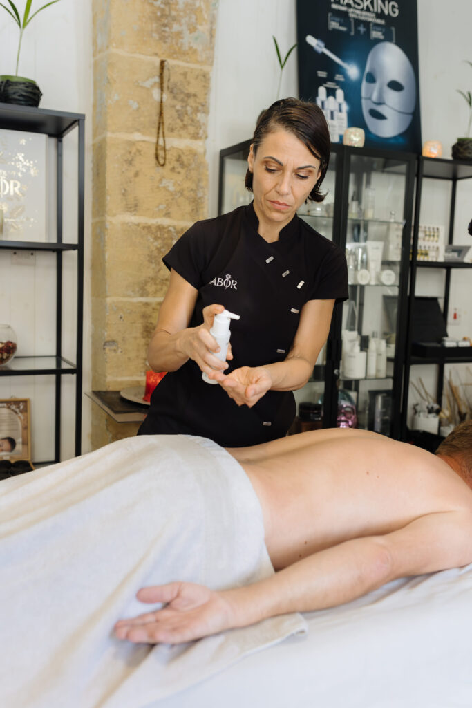 Alchemy Valletta team expert jasmine the founder making a massage